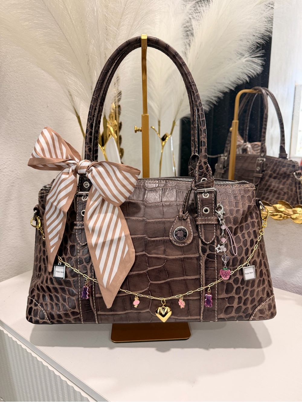Dooney & Bourke Brown Croc-Embossed Satchel with Charm Chain and Striped Bow